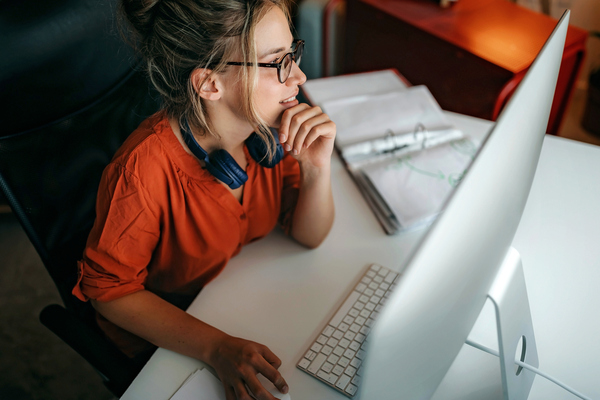 Woman analysing data on computer